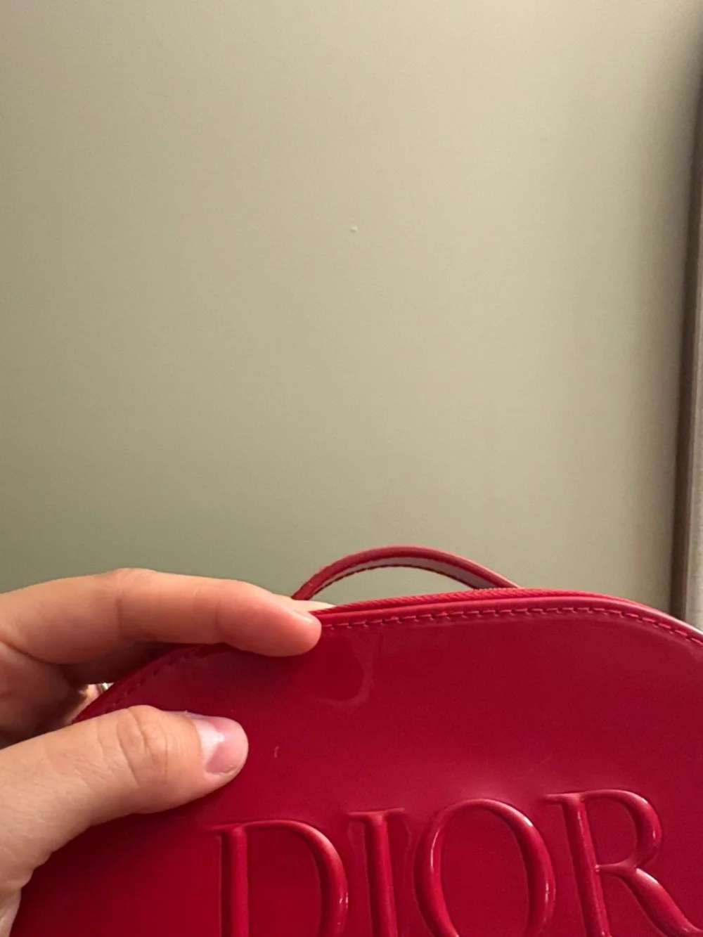 Dior Red Patent Oval Cosmetic Case with Embossed Logo